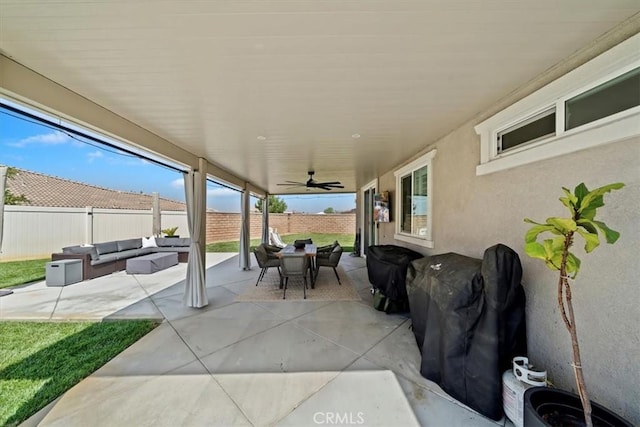 20909 Spring St, Riverside, CA 92507 - fenced backyard with outdoor dining area, an outdoor living space, a patio area, and a ceiling fan