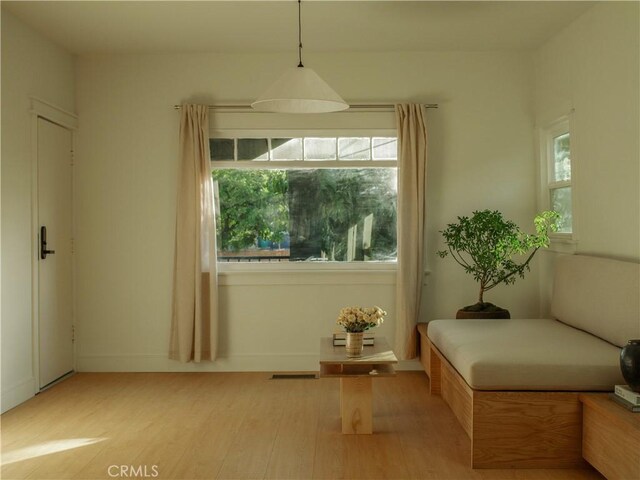 1807 Montana St, Los Angeles, CA 90026 - living area with wood finished floors and healthy amount of natural light