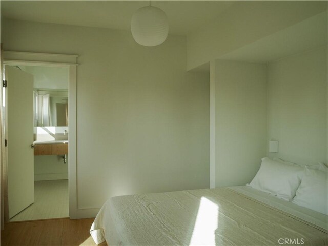 1807 Montana St, Los Angeles, CA 90026 - bedroom featuring wood finished floors