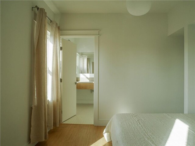 1807 Montana St, Los Angeles, CA 90026 - bedroom with light wood-style flooring