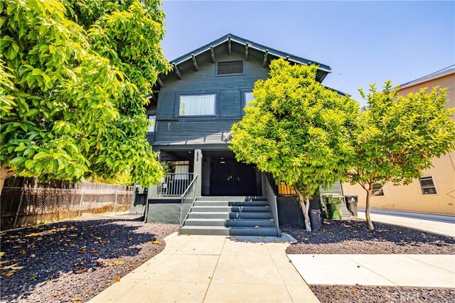 1807 Montana St, Los Angeles, CA 90026 - view of property hidden behind natural elements featuring covered porch