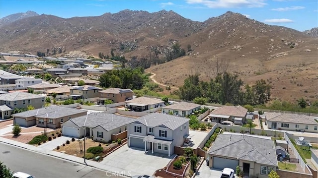 20697 Bison Mesa Rd, Riverside, CA 92507 - aerial perspective of suburban area with a mountainous background