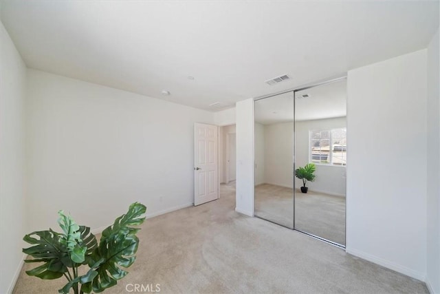20697 Bison Mesa Rd, Riverside, CA 92507 - unfurnished bedroom featuring carpet and a closet