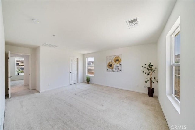 20697 Bison Mesa Rd, Riverside, CA 92507 - empty room with light colored carpet and a smoke detector