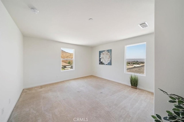 20697 Bison Mesa Rd, Riverside, CA 92507 - carpeted empty room with baseboards and a smoke detector