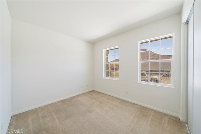 20697 Bison Mesa Rd, Riverside, CA 92507 - empty room featuring light colored carpet