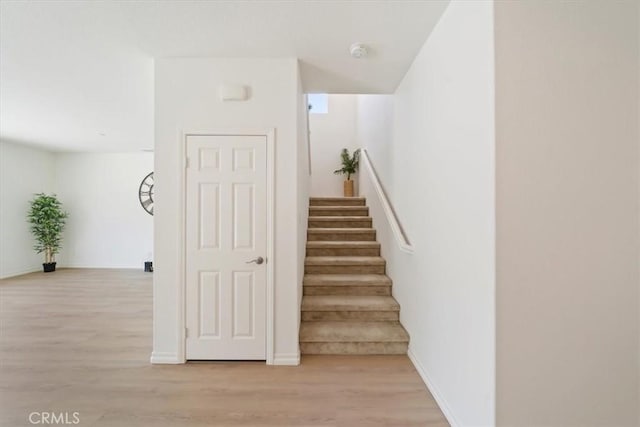 20697 Bison Mesa Rd, Riverside, CA 92507 - stairway featuring wood finished floors and baseboards