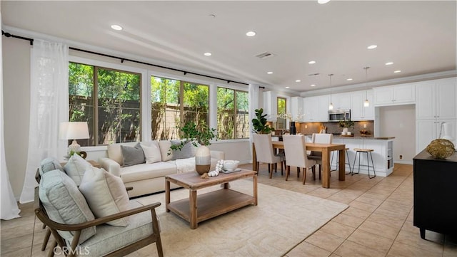 233 Bright Poppy, Irvine, CA 92618 - living room with light tile patterned floors and recessed lighting