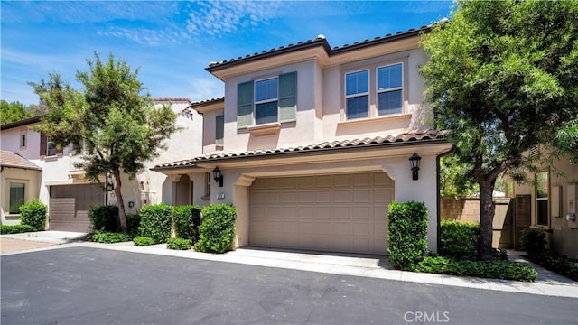 233 Bright Poppy, Irvine, CA 92618 - mediterranean / spanish-style home with an attached garage, stucco siding, and a tile roof