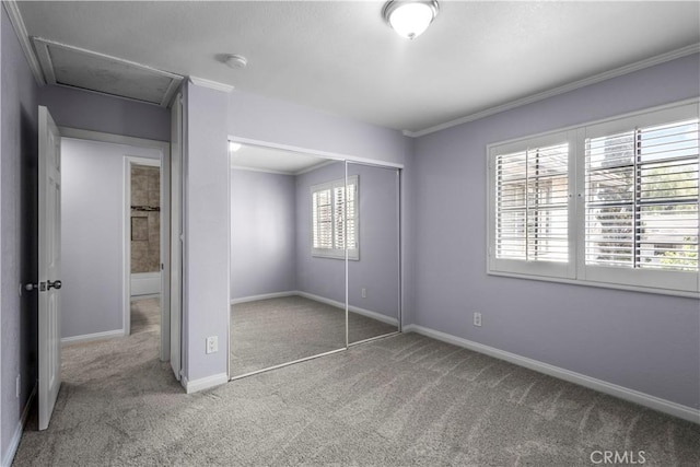 8211 Winnetka Ave Unit 201, Winnetka, CA 91306 - unfurnished bedroom featuring carpet, a closet, and ornamental molding
