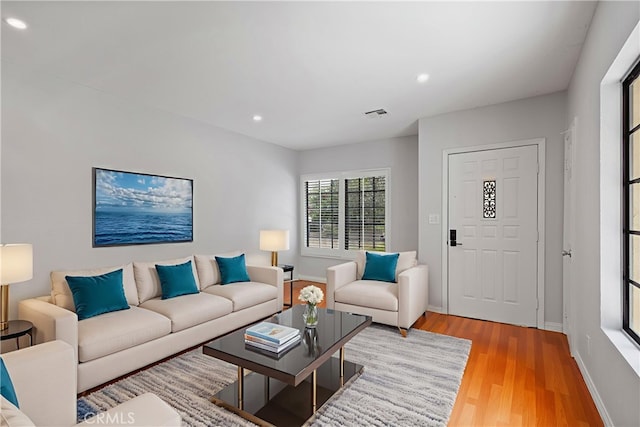 8211 Winnetka Ave Unit 201, Winnetka, CA 91306 - living area with light wood-style floors and recessed lighting