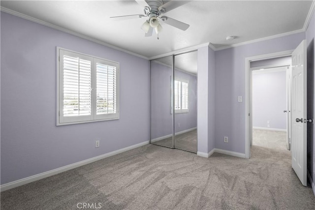 8211 Winnetka Ave Unit 201, Winnetka, CA 91306 - unfurnished bedroom with ornamental molding, carpet floors, a closet, and a ceiling fan
