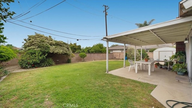 5007 Walnut Ave, Chino, CA 91710 - fenced backyard featuring a shed and a patio area