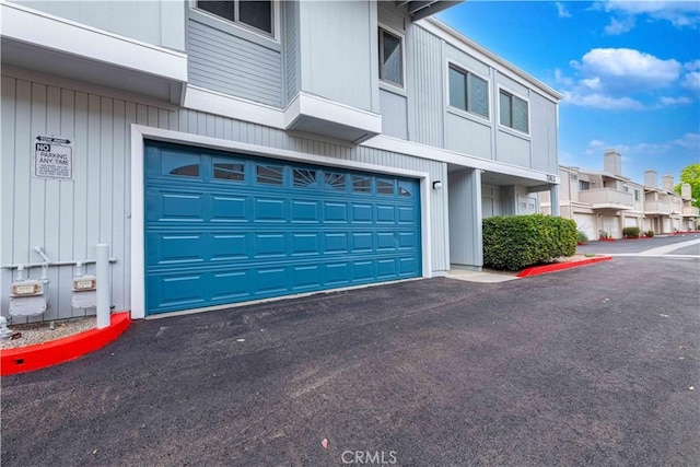 1363 San Simeon Ct Unit 7, Ventura, CA 93003 - garage featuring a residential view