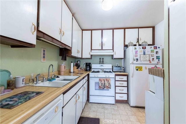 1363 San Simeon Ct Unit 7, Ventura, CA 93003 - kitchen featuring white appliances, white cabinetry, light countertops, and under cabinet range hood
