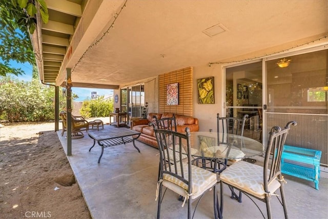 8160 Cholla Ave, Yucca Valley, CA 92284 - view of patio / terrace featuring outdoor dining space