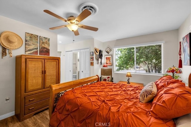 8160 Cholla Ave, Yucca Valley, CA 92284 - bedroom featuring wood finished floors and a ceiling fan