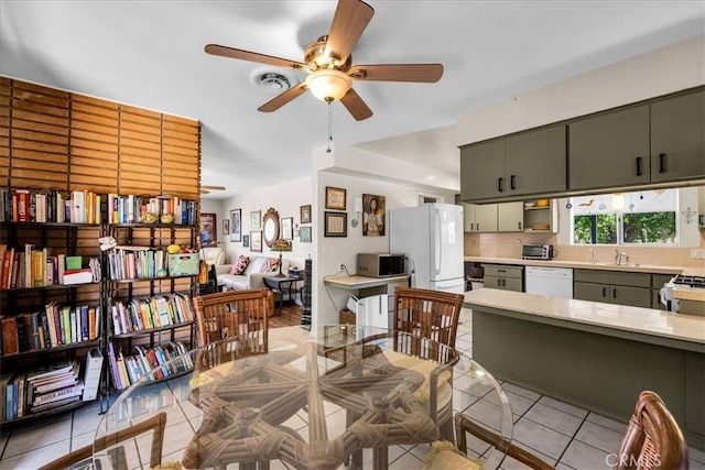8160 Cholla Ave, Yucca Valley, CA 92284 - dining area featuring light tile patterned flooring and a ceiling fan