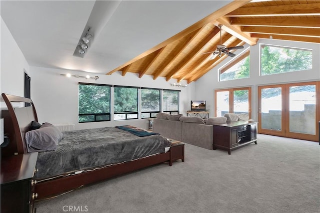 77 Park Dr, Running Springs, CA 92382 - bedroom with light colored carpet and access to exterior