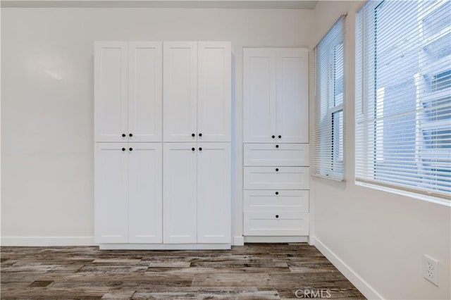 121/2 25th Pl Unit 2, Venice, CA 90291 - unfurnished bedroom featuring a closet and dark wood-type flooring