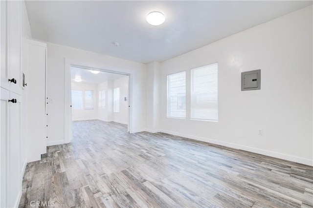 121/2 25th Pl Unit 2, Venice, CA 90291 - spare room with light wood-type flooring, healthy amount of natural light, and electric panel
