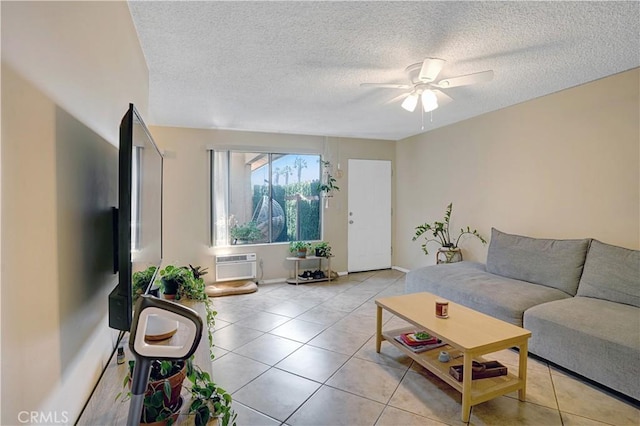 4743 Jackson St Unit 69, Riverside, CA 92503 - living area featuring a ceiling fan, light tile patterned floors, a textured ceiling, and a wall mounted AC