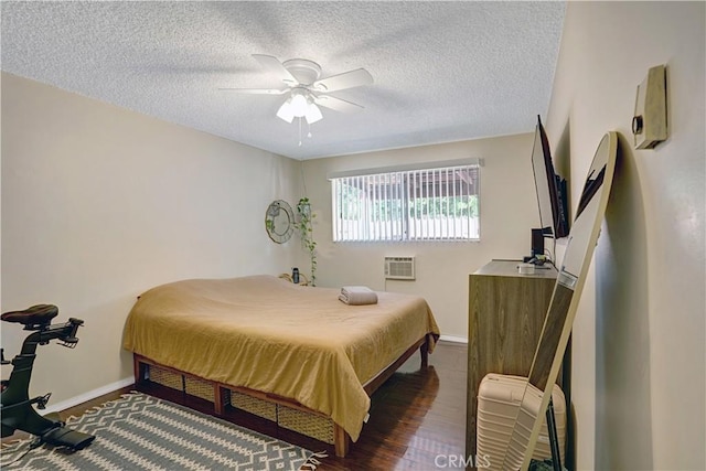 4743 Jackson St Unit 69, Riverside, CA 92503 - bedroom with a wall mounted air conditioner, a textured ceiling, and a ceiling fan