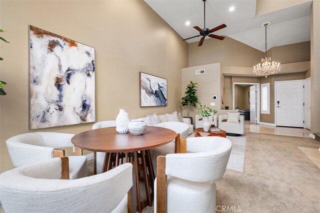 25066 El Carrizo, Laguna Niguel, CA 92677 - dining area featuring a ceiling fan, a chandelier, recessed lighting, high vaulted ceiling, and light carpet