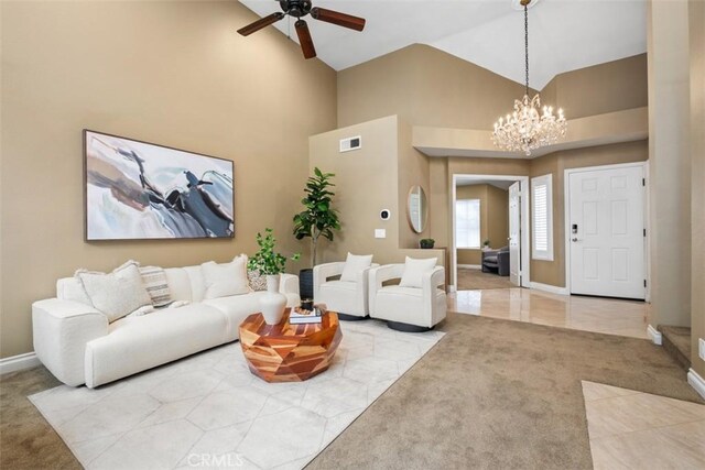 25066 El Carrizo, Laguna Niguel, CA 92677 - carpeted living room with a ceiling fan, high vaulted ceiling, and a chandelier