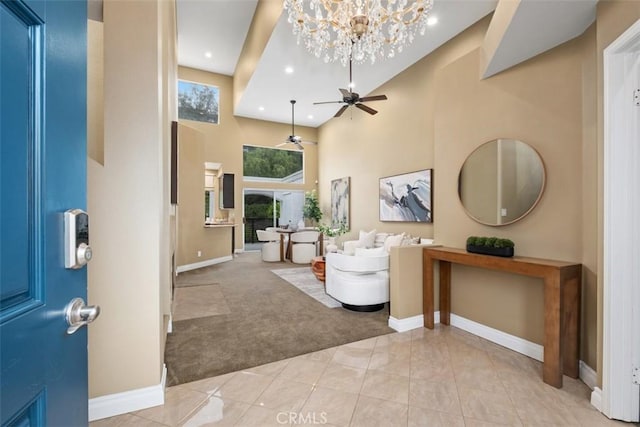 25066 El Carrizo, Laguna Niguel, CA 92677 - entryway with light carpet, a high ceiling, ceiling fan, recessed lighting, and a chandelier