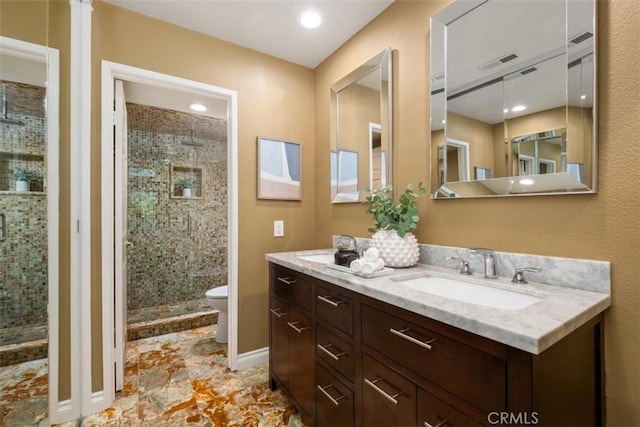 25066 El Carrizo, Laguna Niguel, CA 92677 - bathroom featuring double vanity, a stall shower, and recessed lighting