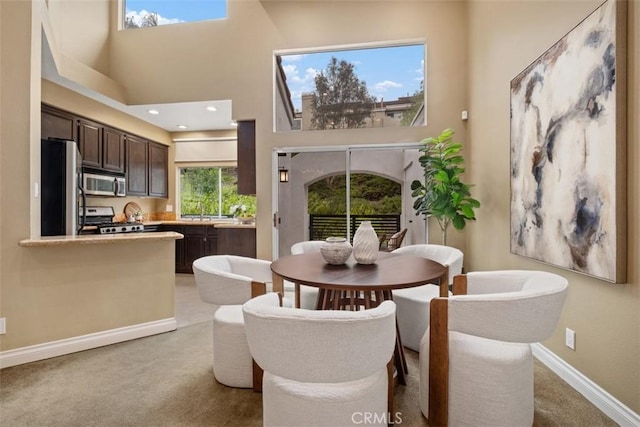 25066 El Carrizo, Laguna Niguel, CA 92677 - dining space featuring light colored carpet and a high ceiling