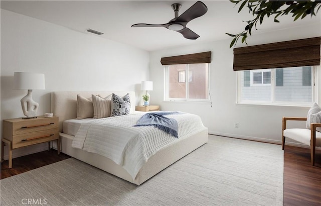29 Surfside Ave Unit B, Surfside, CA 90743 - bedroom with wood finished floors and a ceiling fan