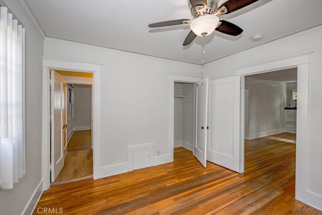315 E Randolph St, Glendale, CA 91207 - unfurnished bedroom with wood finished floors, a closet, ornamental molding, and ceiling fan