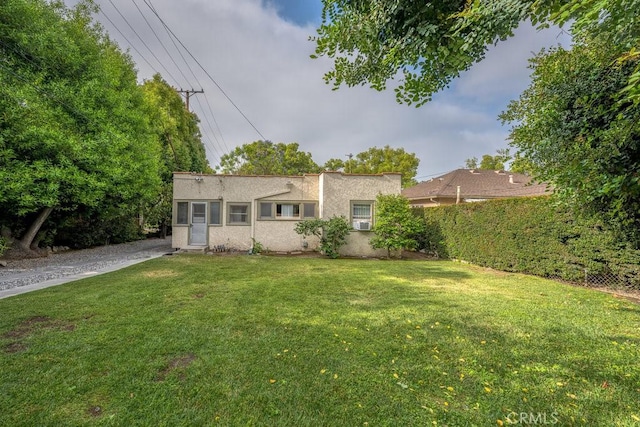 315 E Randolph St, Glendale, CA 91207 - view of front of house featuring stucco siding and a front yard