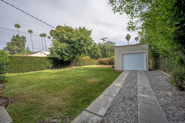 315 E Randolph St, Glendale, CA 91207 - view of green lawn featuring an outbuilding, driveway, and a garage
