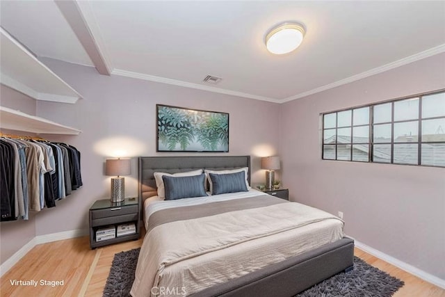 215 N Maple Ave Unit A, Montebello, CA 90640 - bedroom with wood finished floors and ornamental molding