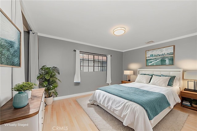 215 N Maple Ave Unit A, Montebello, CA 90640 - bedroom featuring wood finished floors and ornamental molding