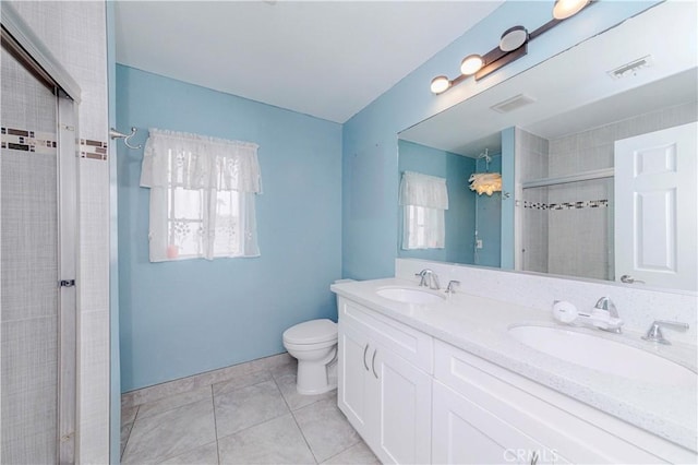215 N Maple Ave Unit A, Montebello, CA 90640 - bathroom featuring a shower stall, double vanity, and tile patterned floors