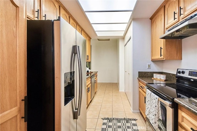 4280 Via Arbolada Unit 338, Los Angeles, CA 90042 - kitchen featuring appliances with stainless steel finishes, under cabinet range hood, and light tile patterned floors