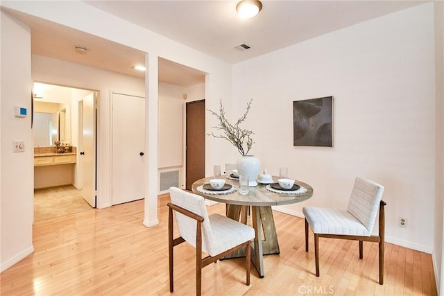 4280 Via Arbolada Unit 338, Los Angeles, CA 90042 - dining room featuring light wood-type flooring and baseboards