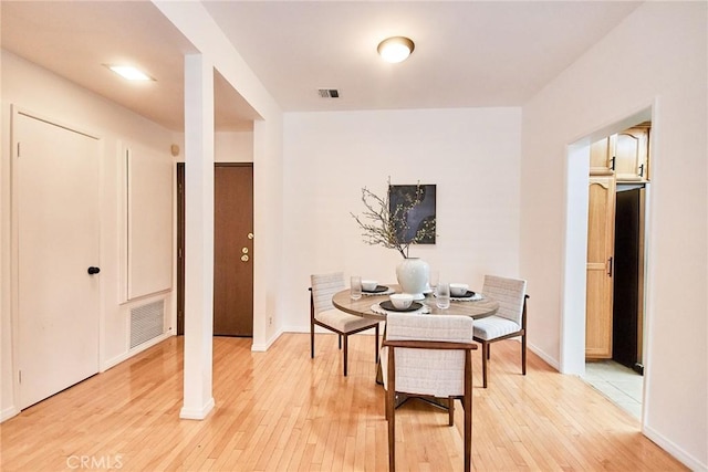 4280 Via Arbolada Unit 338, Los Angeles, CA 90042 - dining space with light wood-style floors and baseboards