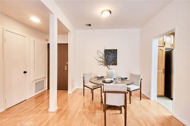 4280 Via Arbolada Unit 338, Los Angeles, CA 90042 - dining space with light wood-type flooring and baseboards