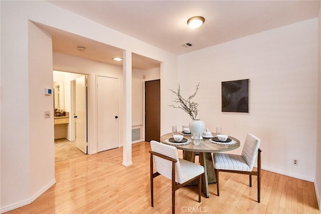 4280 Via Arbolada Unit 338, Los Angeles, CA 90042 - dining space featuring light wood-style flooring and baseboards