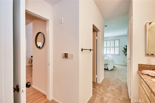 4280 Via Arbolada Unit 338, Los Angeles, CA 90042 - corridor featuring baseboards and light carpet