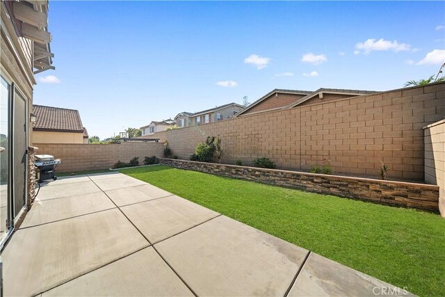 13126 Flagstaff Dr, Rancho Cucamonga, CA 91739 - fenced backyard with a patio area
