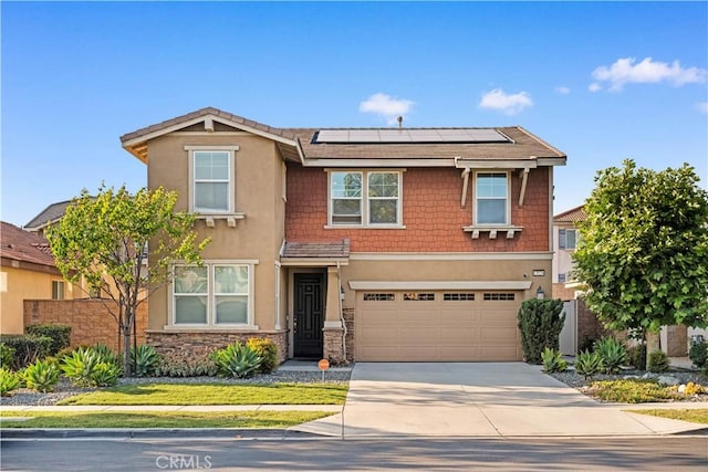 13126 Flagstaff Dr, Rancho Cucamonga, CA 91739 - view of front of property with concrete driveway, roof mounted solar panels, an attached garage, stone siding, and stucco siding