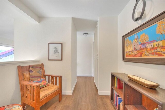 1531 Corte Caballo Unit 33, Upland, CA 91786 - corridor featuring wood finished floors and baseboards