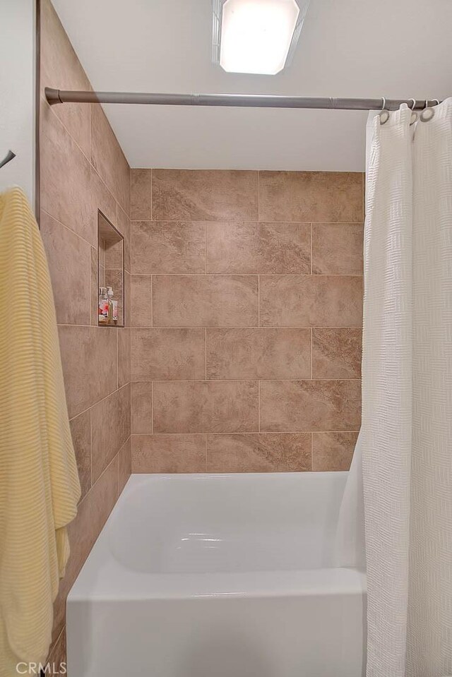 1531 Corte Caballo Unit 33, Upland, CA 91786 - bathroom with shower / bath combo with shower curtain