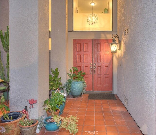 1531 Corte Caballo Unit 33, Upland, CA 91786 - view of exterior entry with stucco siding